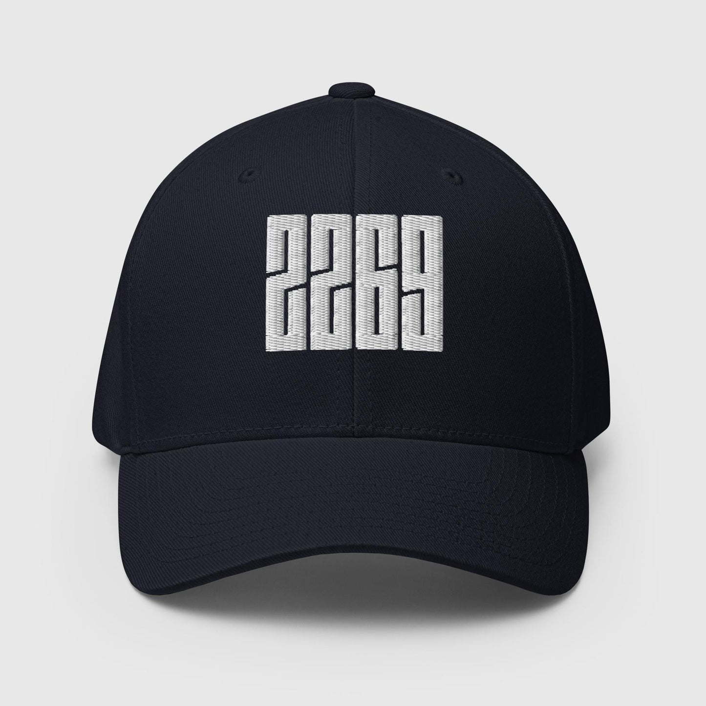 Dark navy fitted baseball hat with white embroidery front and back