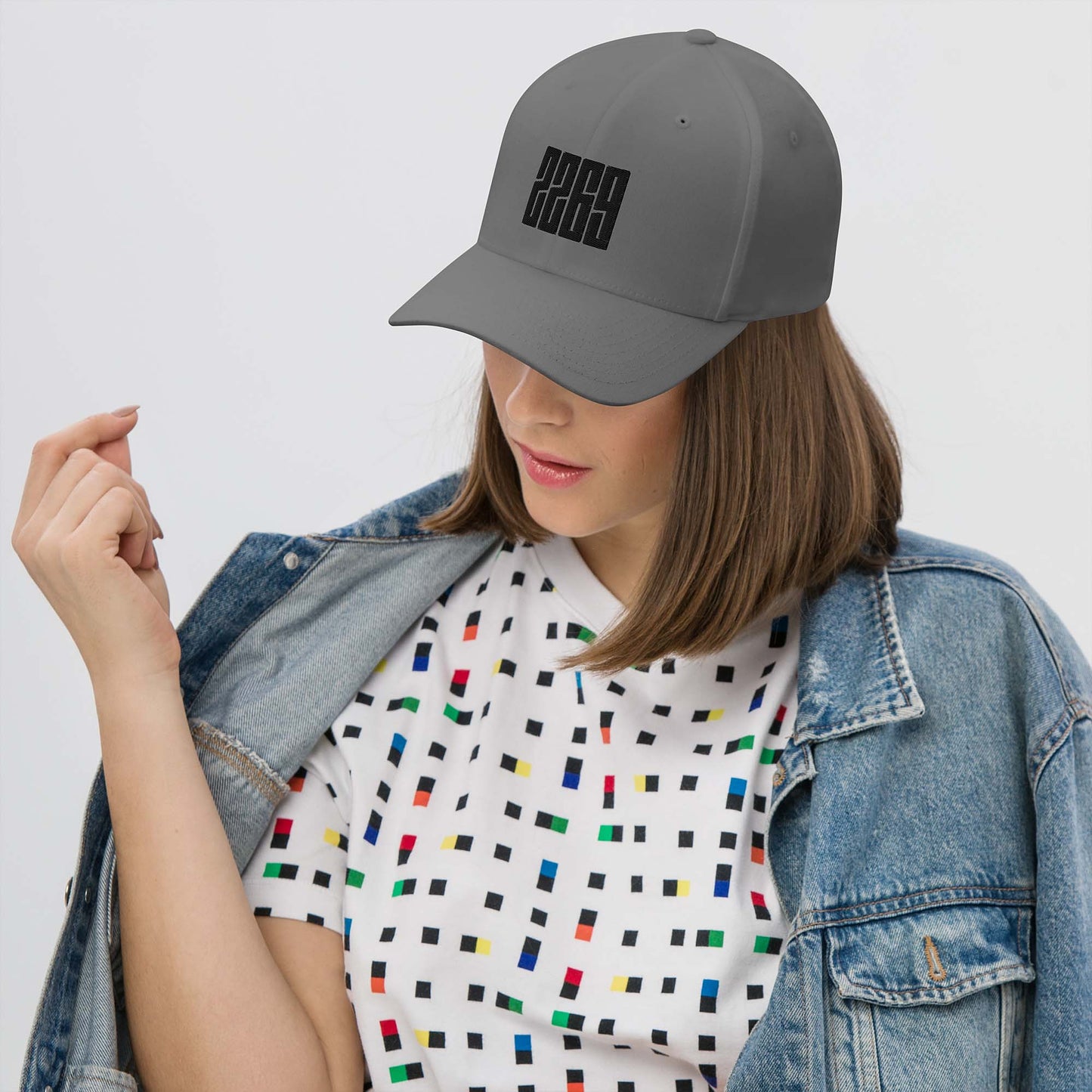 Grey fitted baseball hat with black embroidery front and back