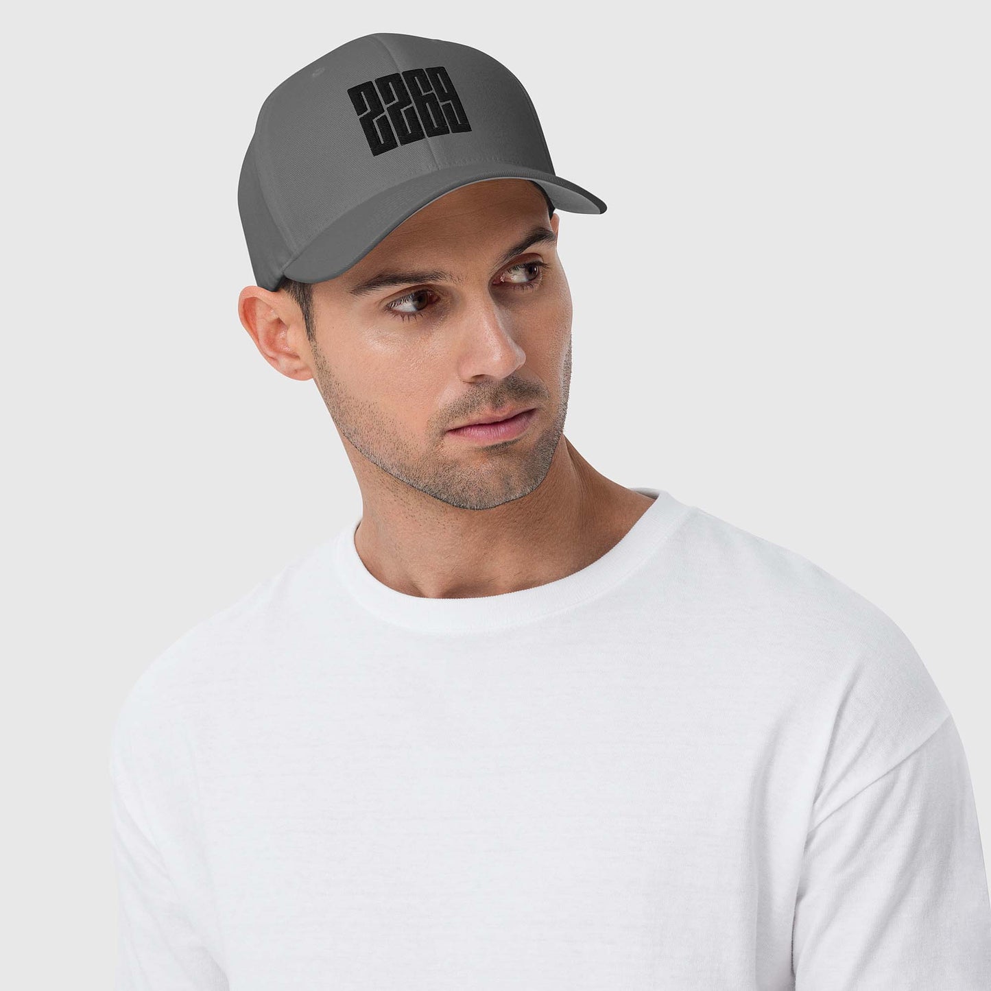 Grey fitted baseball hat with black embroidery front and back