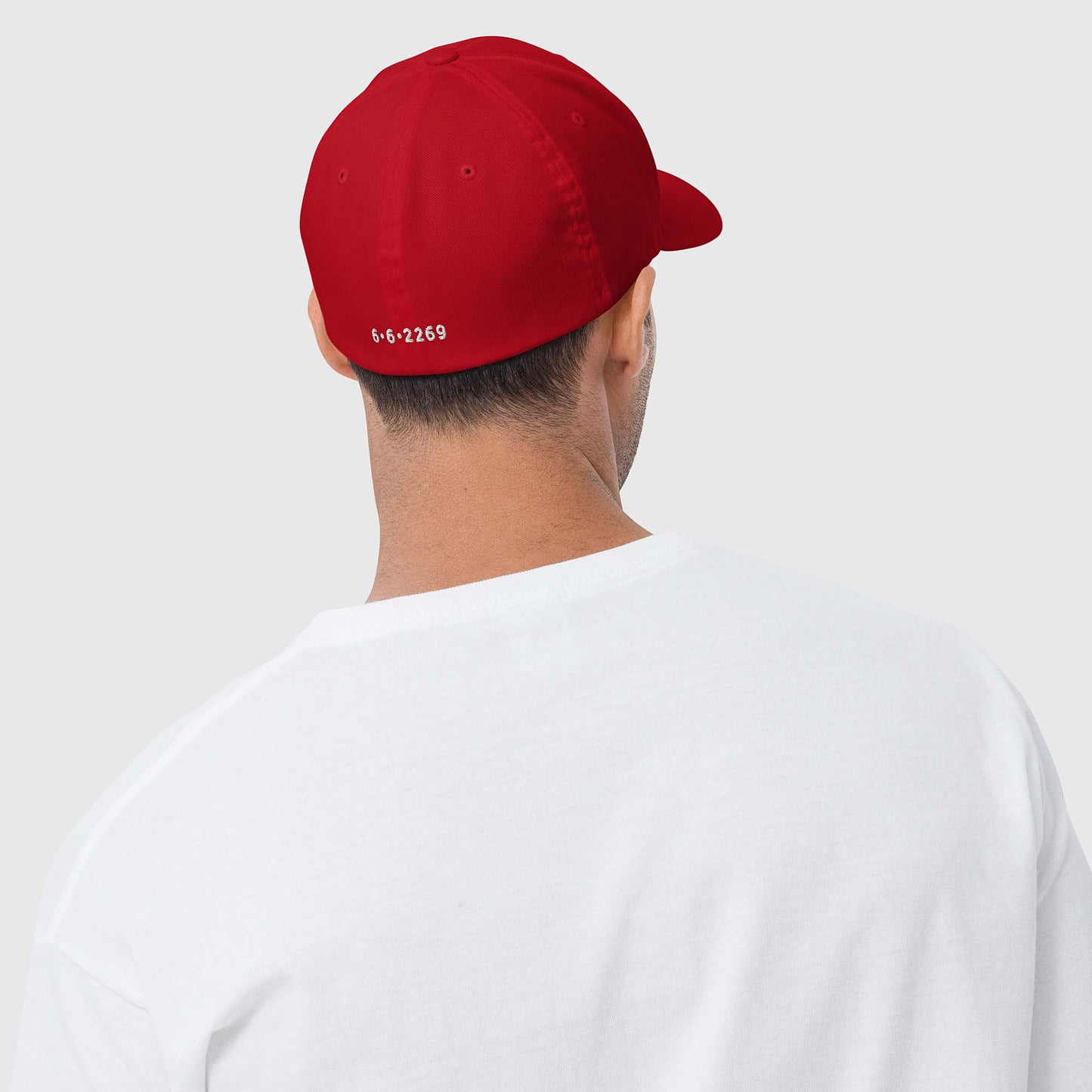 Red fitted baseball hat with white embroidery front and back