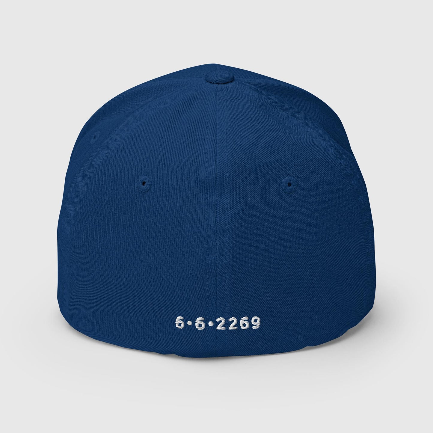 Royal blue fitted baseball hat with white embroidery front and back