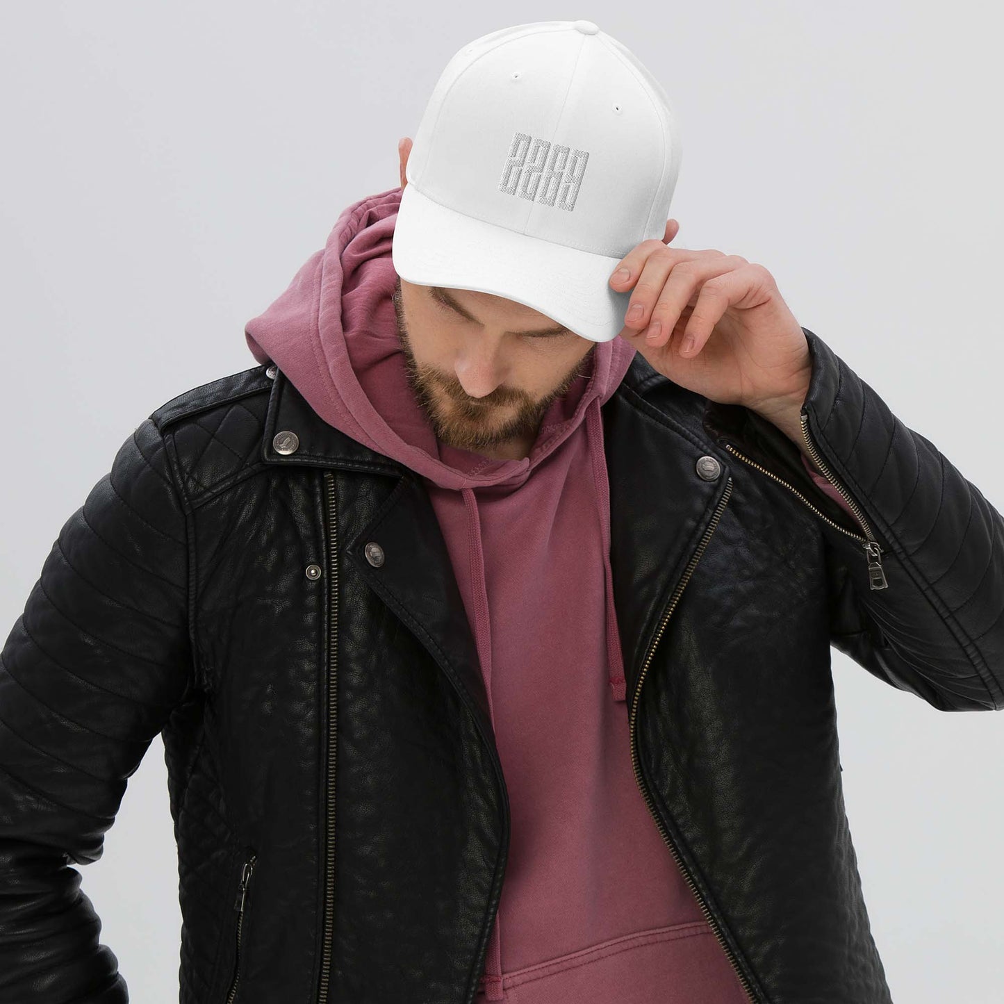 White fitted baseball hat with subtle embroidery front and back