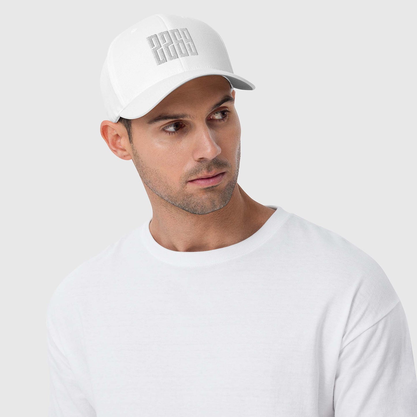 White fitted baseball hat with subtle embroidery front and back