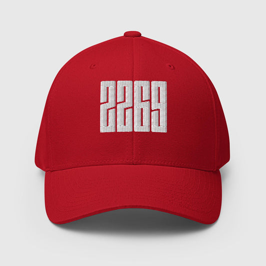Red fitted baseball hat with white embroidery front and back