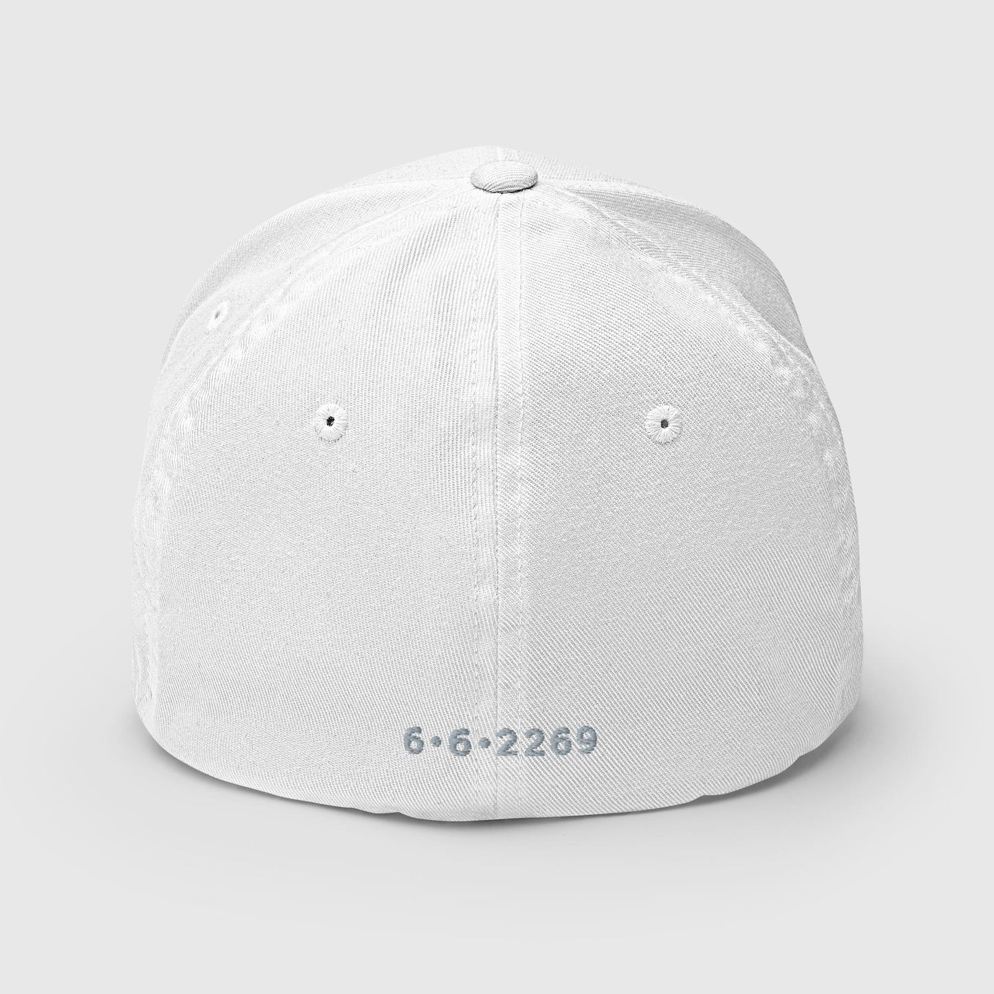 White fitted baseball hat with subtle embroidery front and back