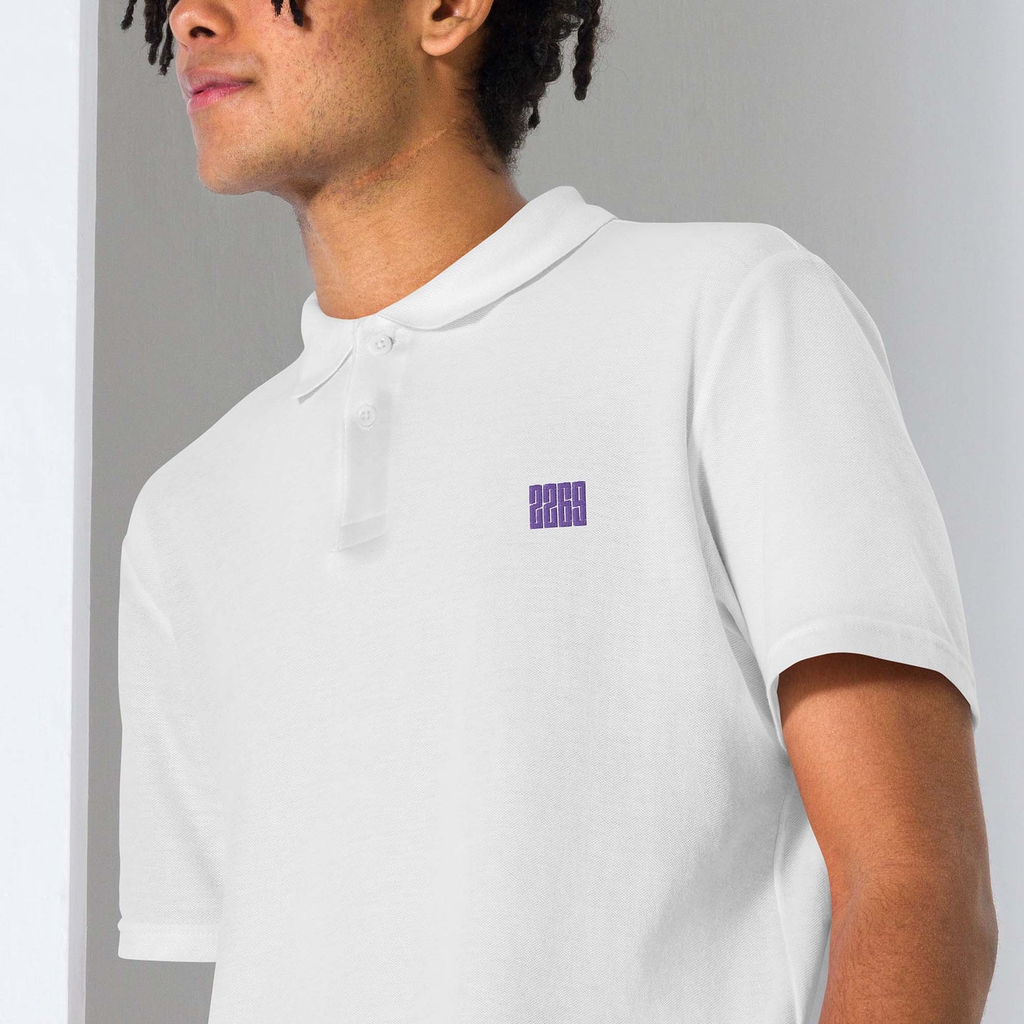 Unisex white pique polo shirt with embroidered 2269 logo